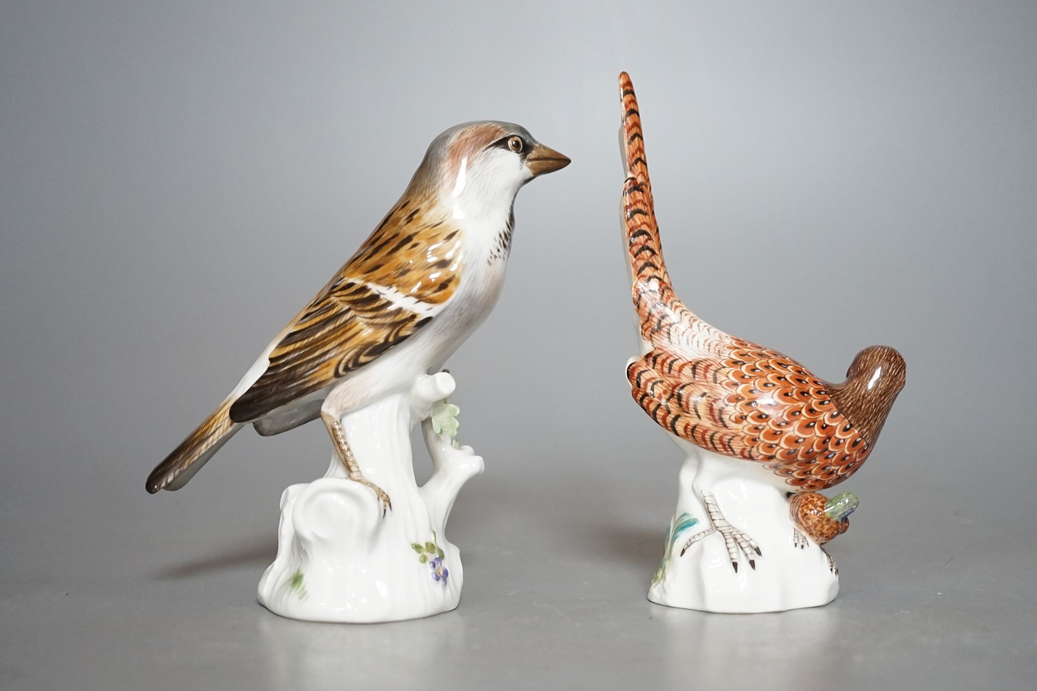 A Meissen porcelain pheasant and sparrow, incised numbers to base, 15cm